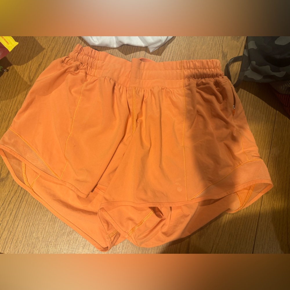 Size ten neon orange lululemon four inch Hotty hot short